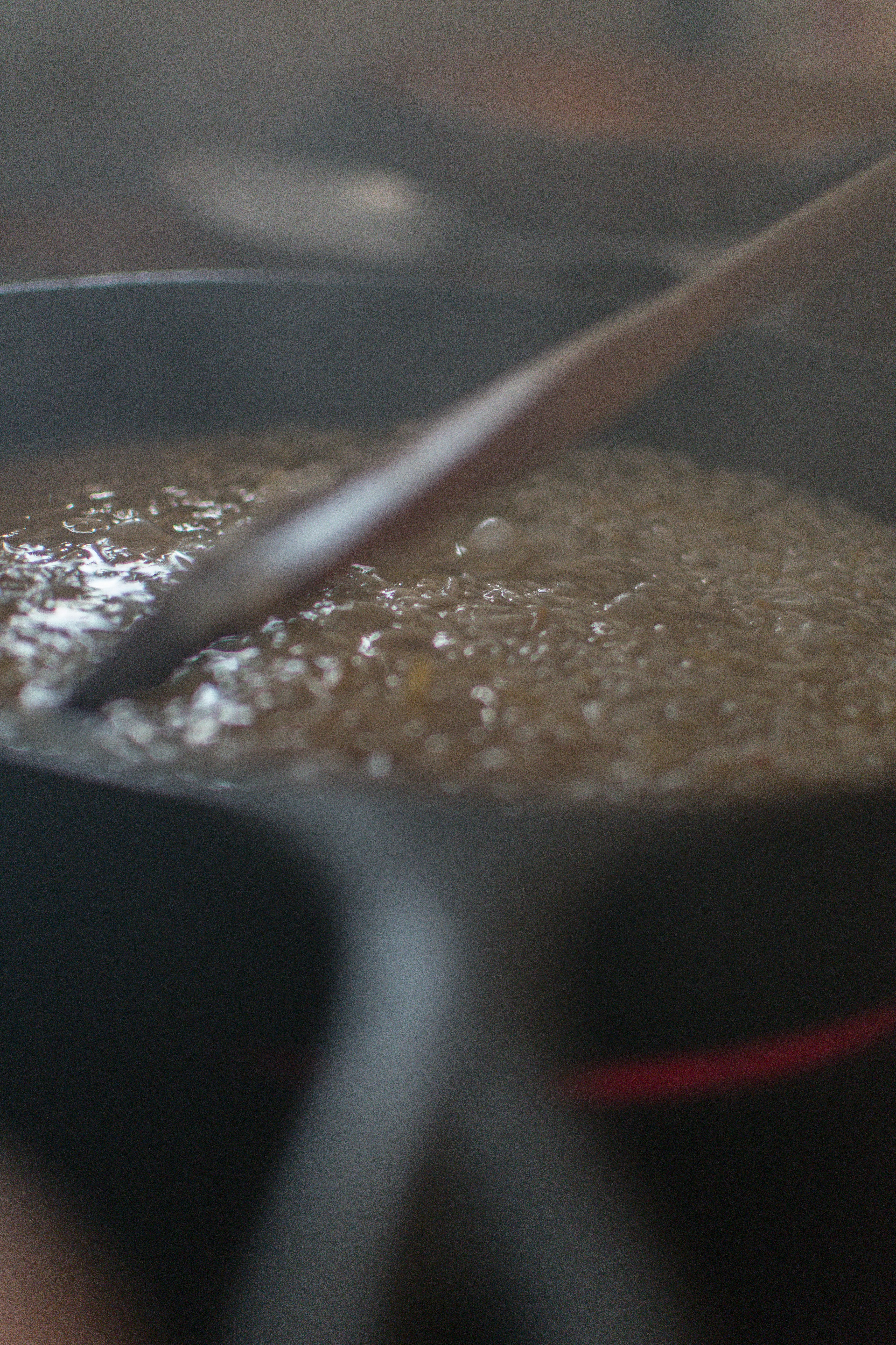 brown soup in black cooking pot