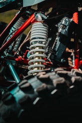 red and black metal tool