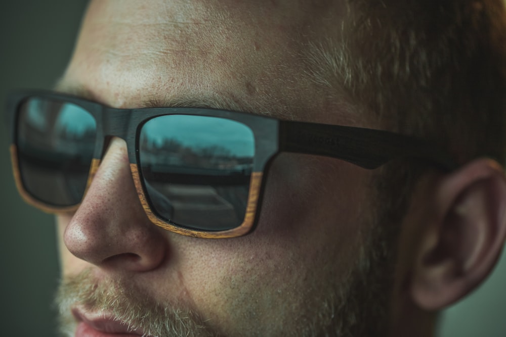 man wearing black framed sunglasses