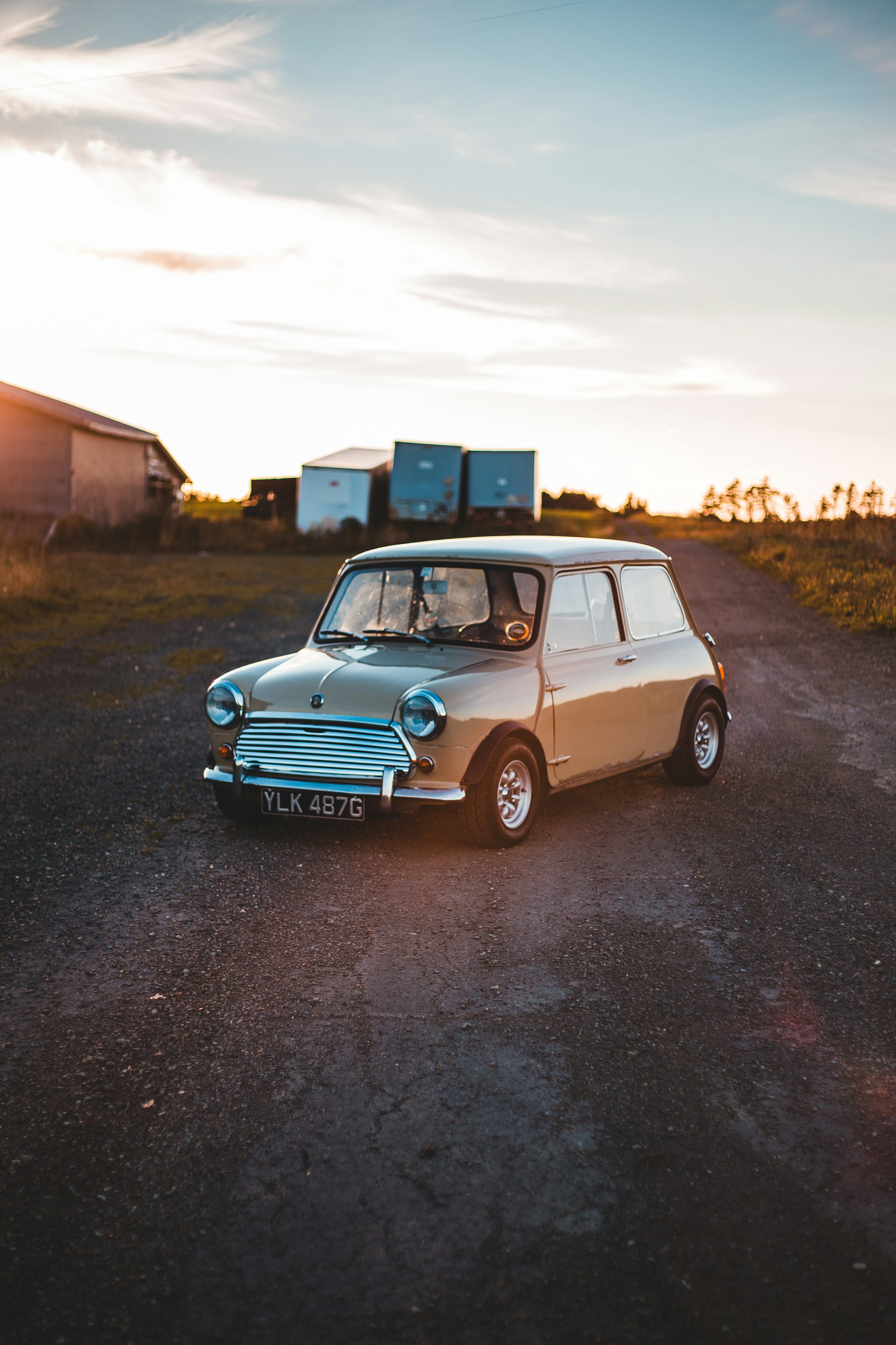 blue and white mini cooper on road during daytime