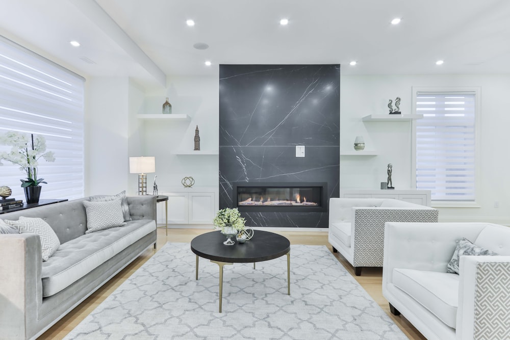 white couch beside black round table