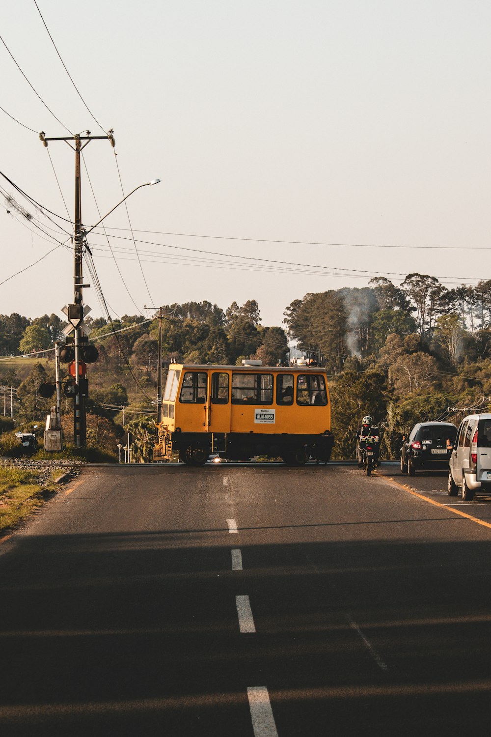 yellow bus on road during daytime