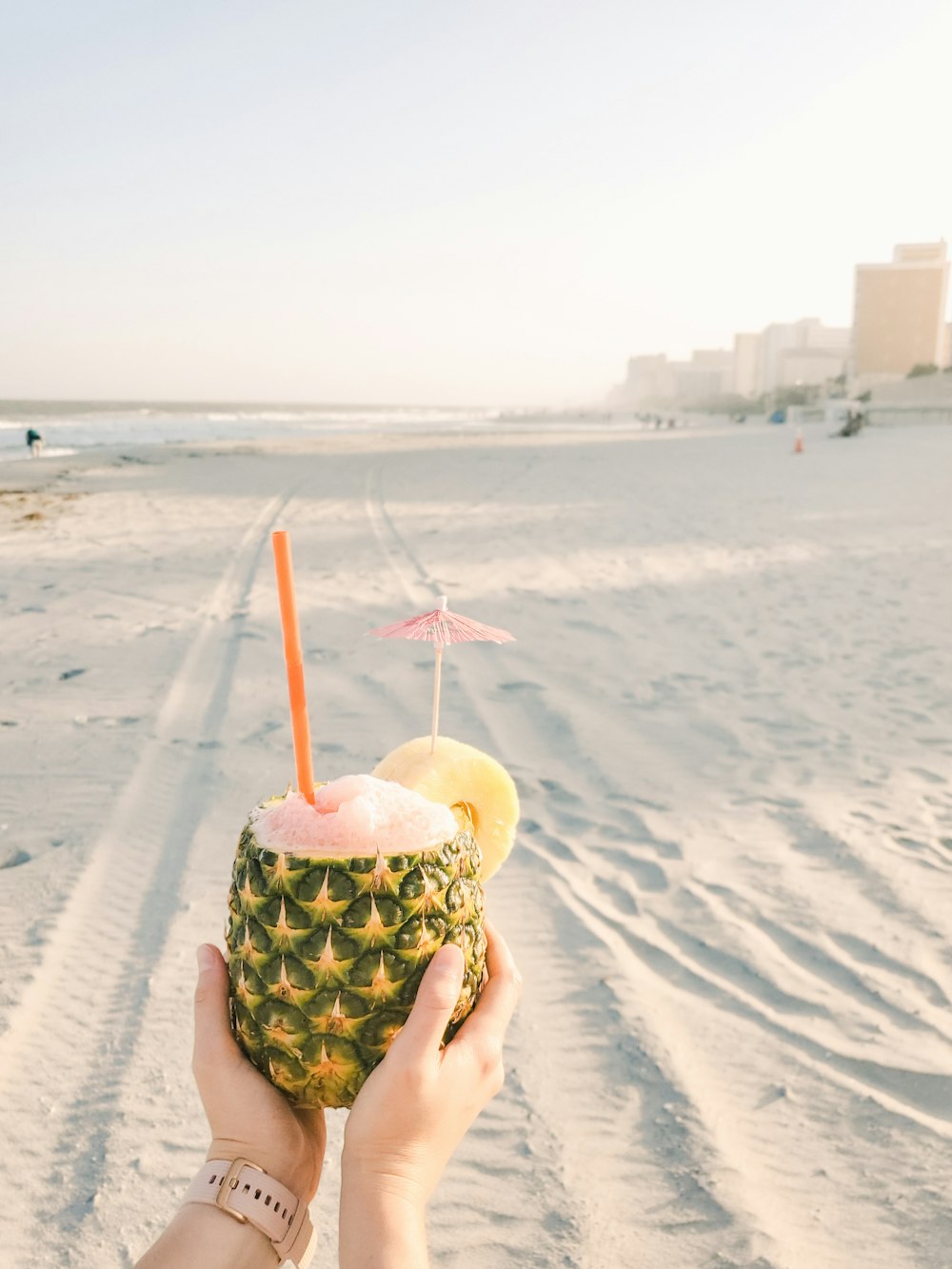 pineapple juice on brown sand