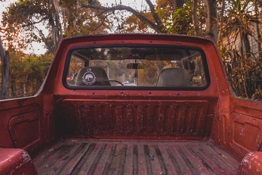 red car parked on the side of the road