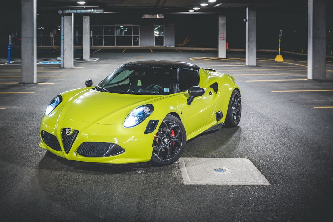 yellow ferrari 458 italia parked on parking lot