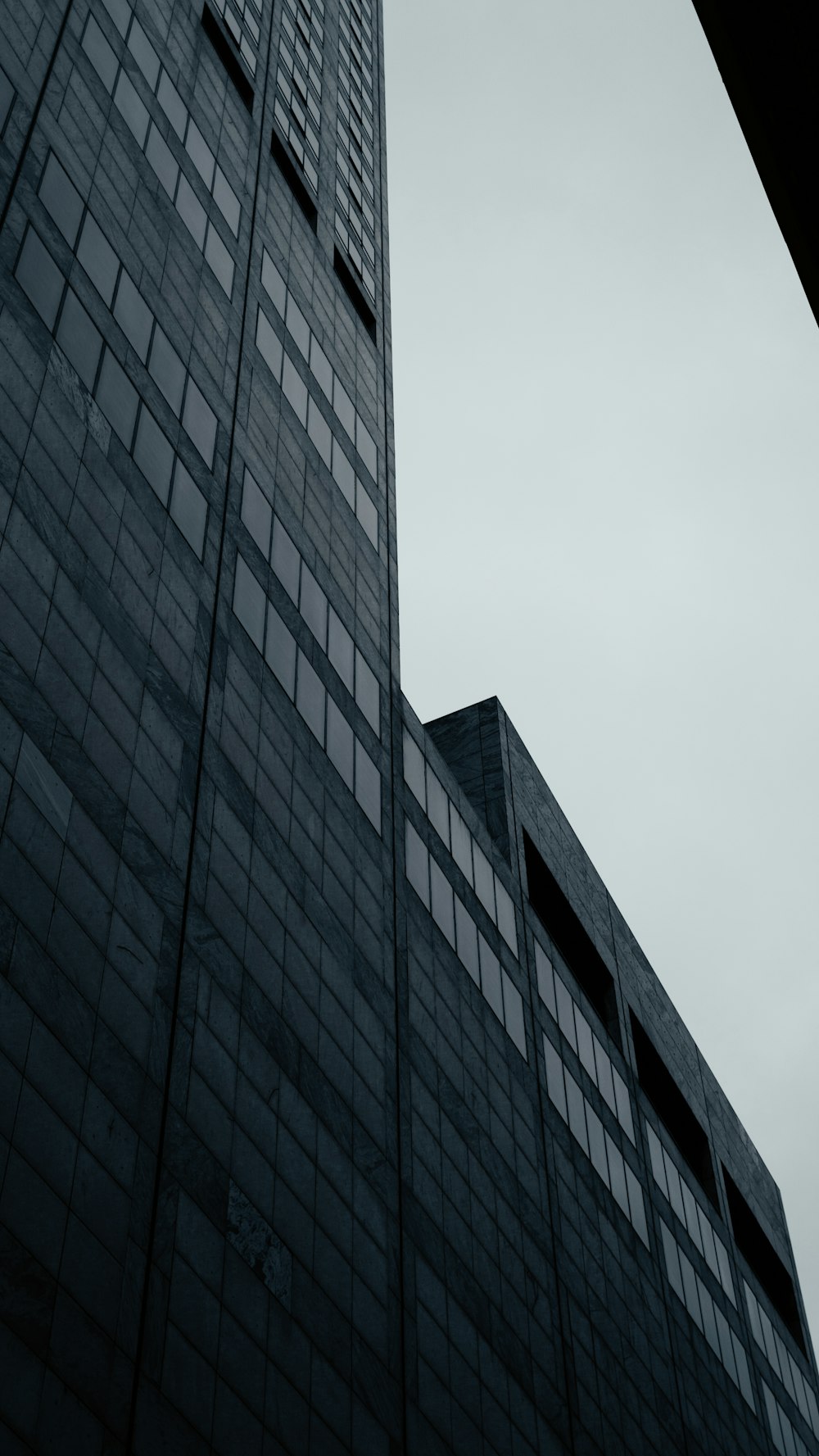 grayscale photo of high rise building