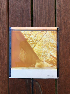 A side-by-side comparison of an old, faded photograph and its vibrant, restored digital version.