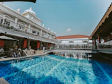 A 3D Revit model showing a luxury residential swimming pool with detailed piping and equipment layout.