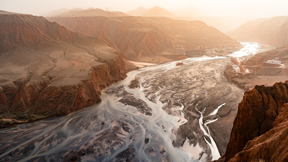 brown and white mountains during daytime