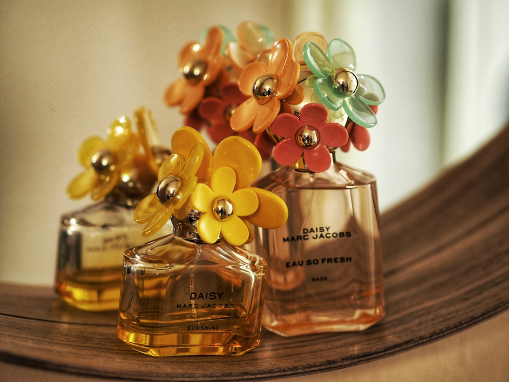 selective focus photography of 50 ml perfume bottle