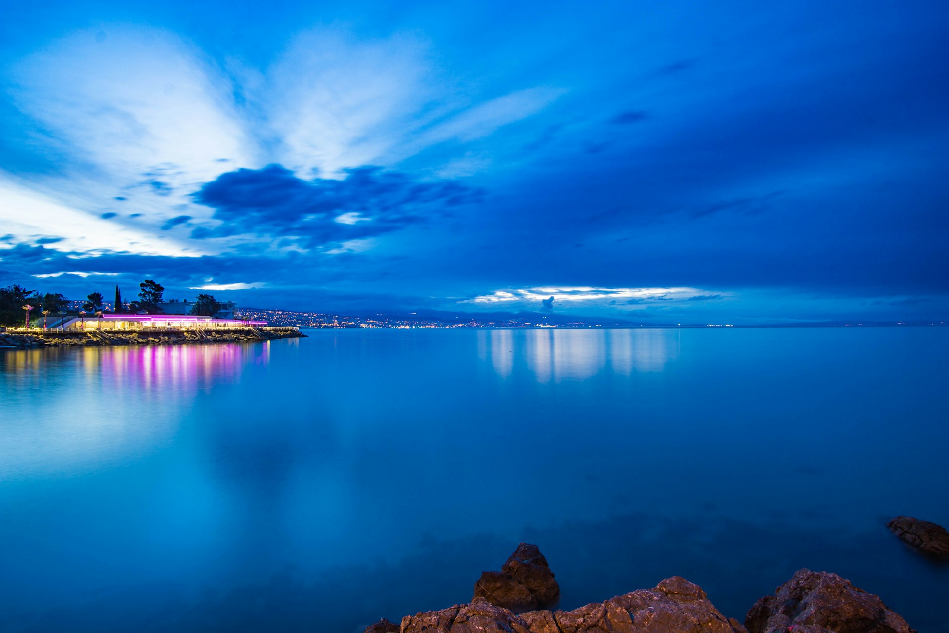 body of water under blue sky during daytime