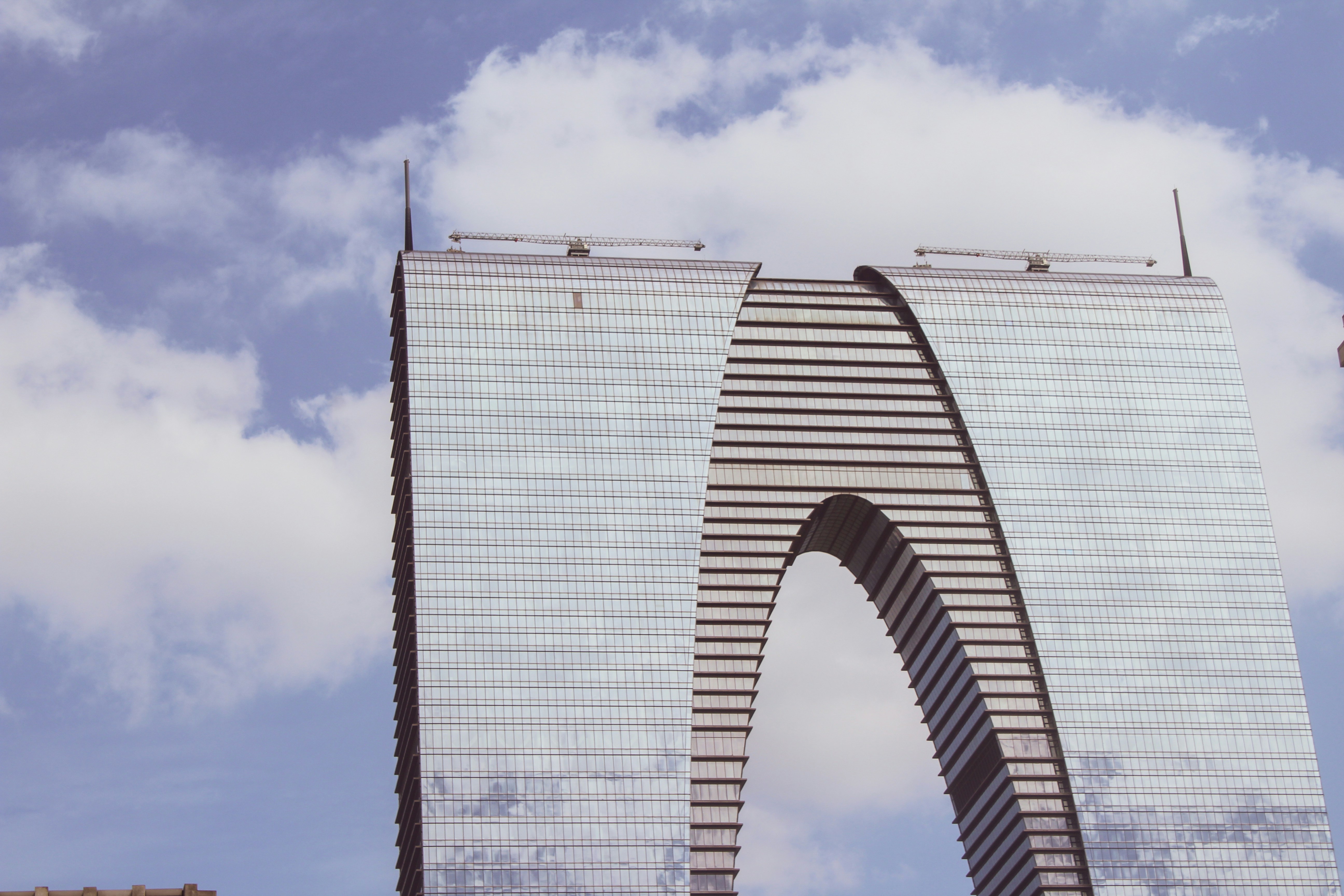 white and black building under blue sky during daytime