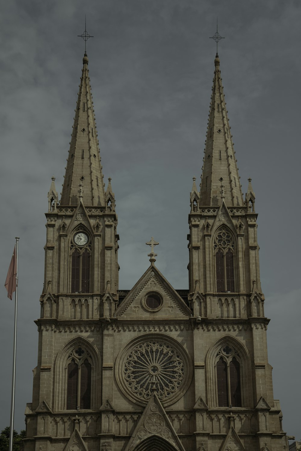 brown concrete church with flag of united states of america