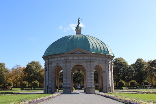 green dome building under blue sky during daytime in Hofgarten Germany