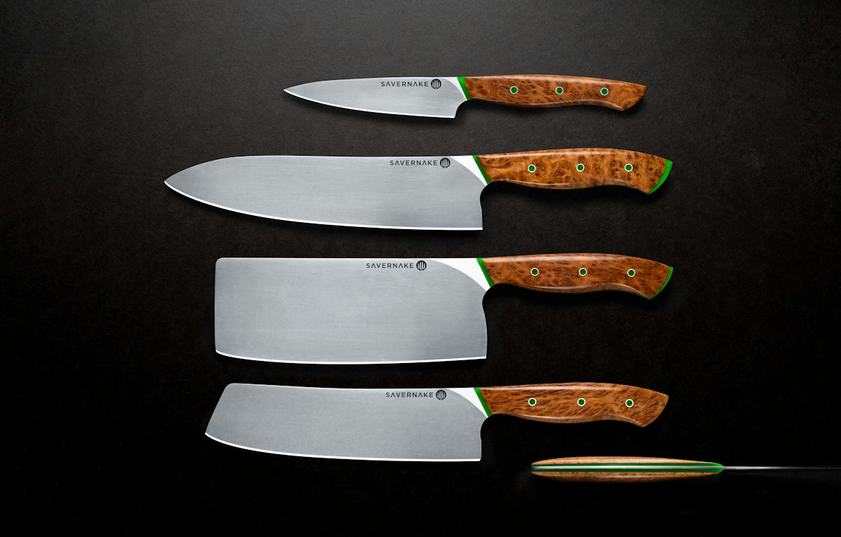 Wooden-handled kitchen knife on a board