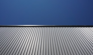 white and black striped textile