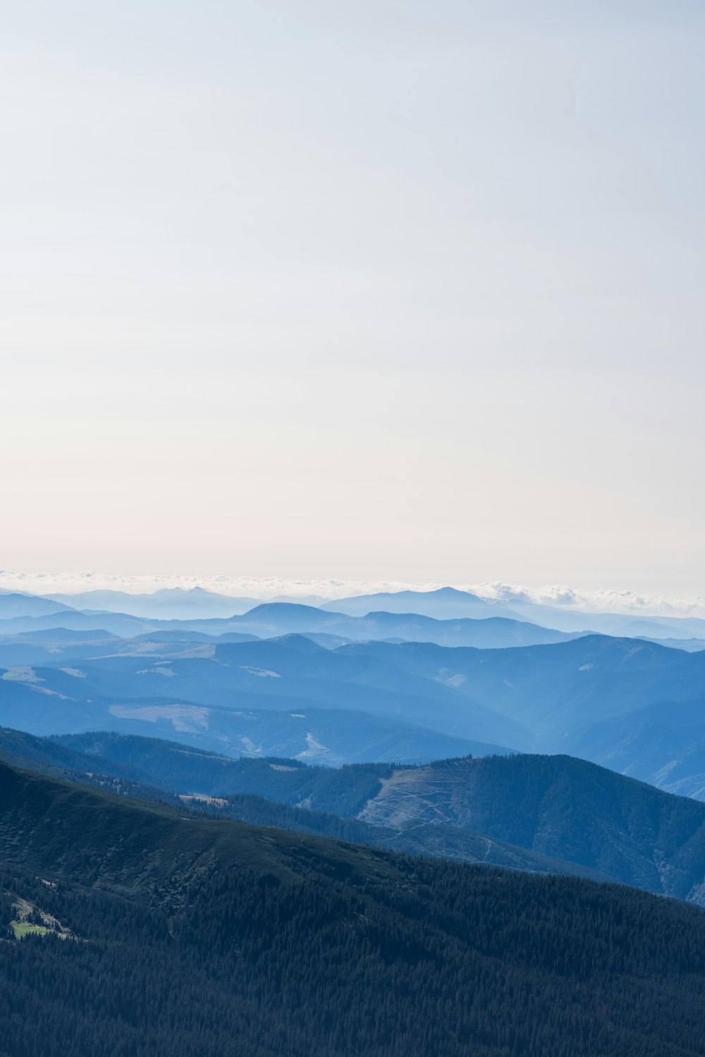 green mountains under white sky during daytime