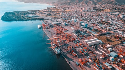 aerial view of city buildings near body of water during daytime trinidad and tobago zoom background