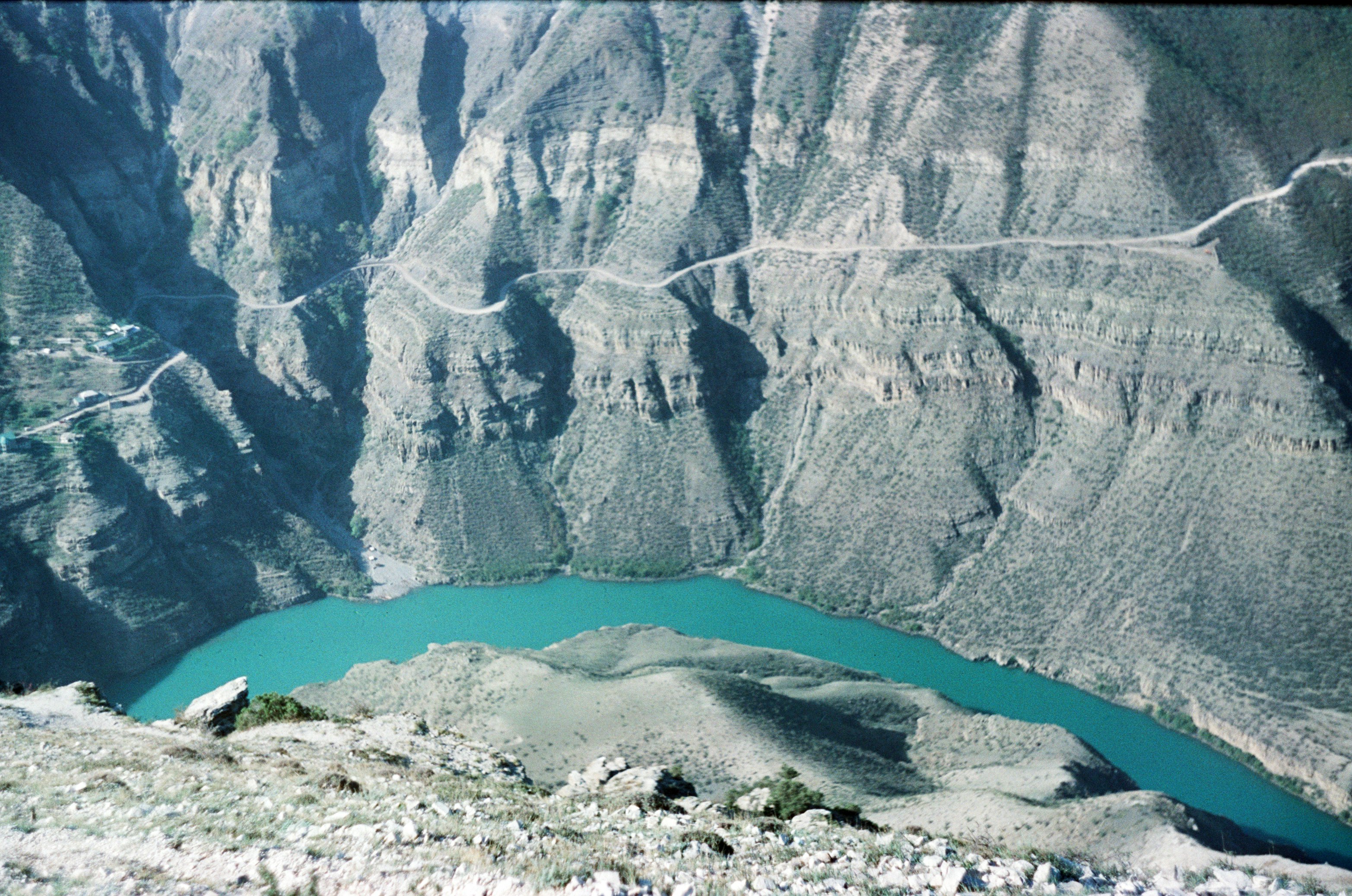 blue lake in the middle of the mountains