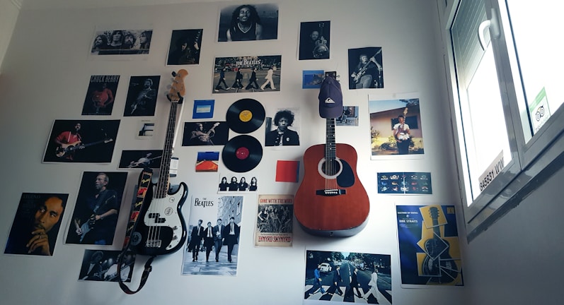 Classic rock band posters decorating the studio wall