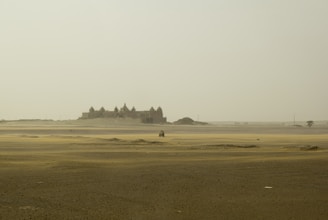 A panoramic view of the siwa77 game world with mystical temples and dark forests.