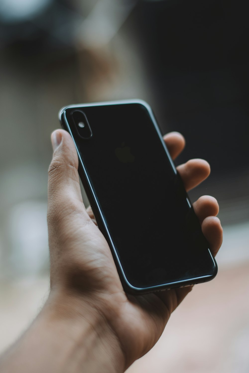 person holding silver iphone 6