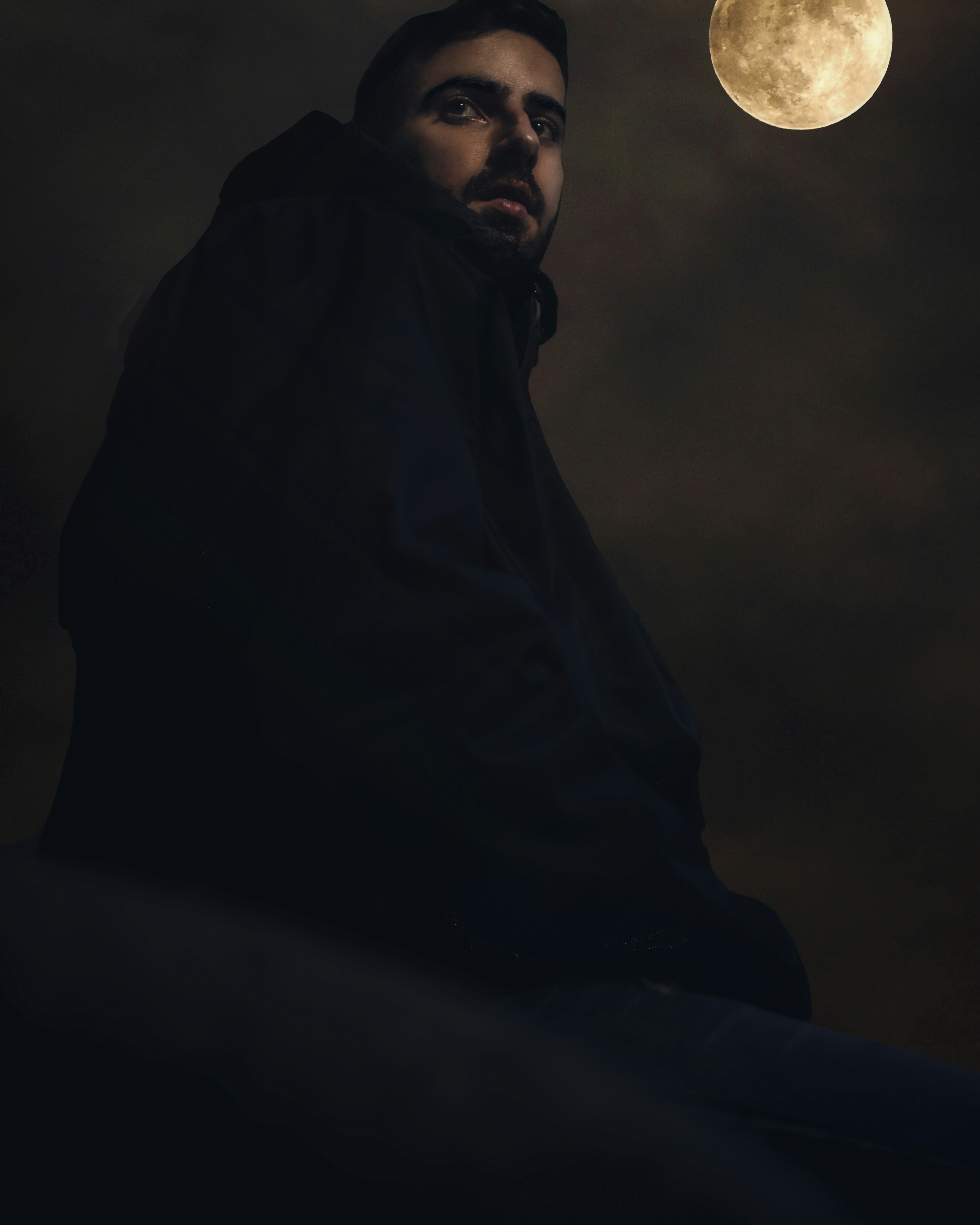 Man in black robe sitting photo – Free Black Image on Unsplash