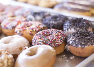 brown donuts on white tray