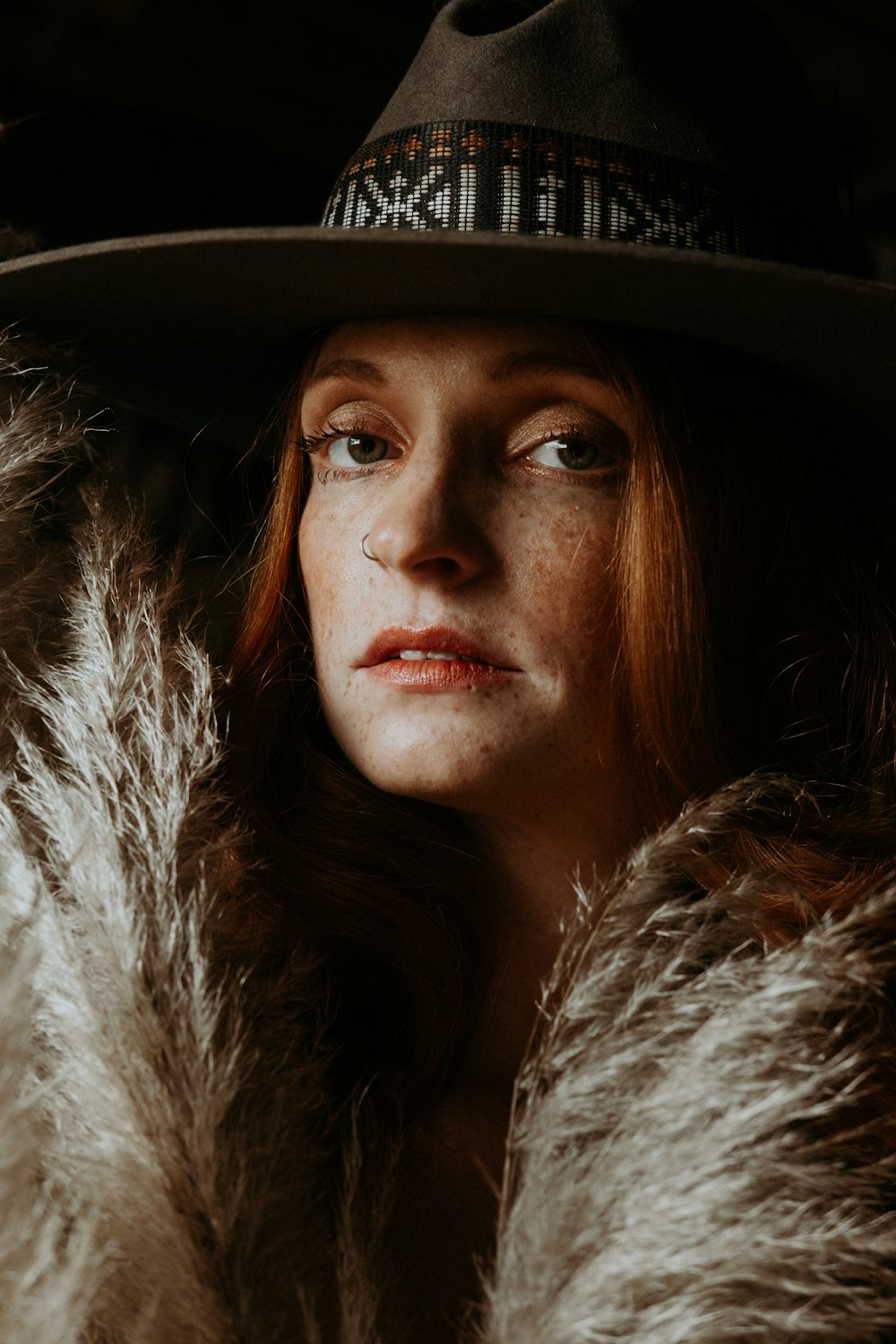 woman in brown and white fur coat