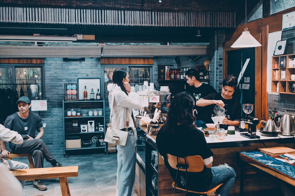 man and woman standing in front of counter