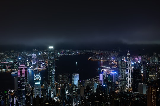 city with high rise buildings during night time in Victoria Peak Garden Hong Kong