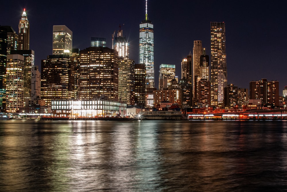 city skyline during night time