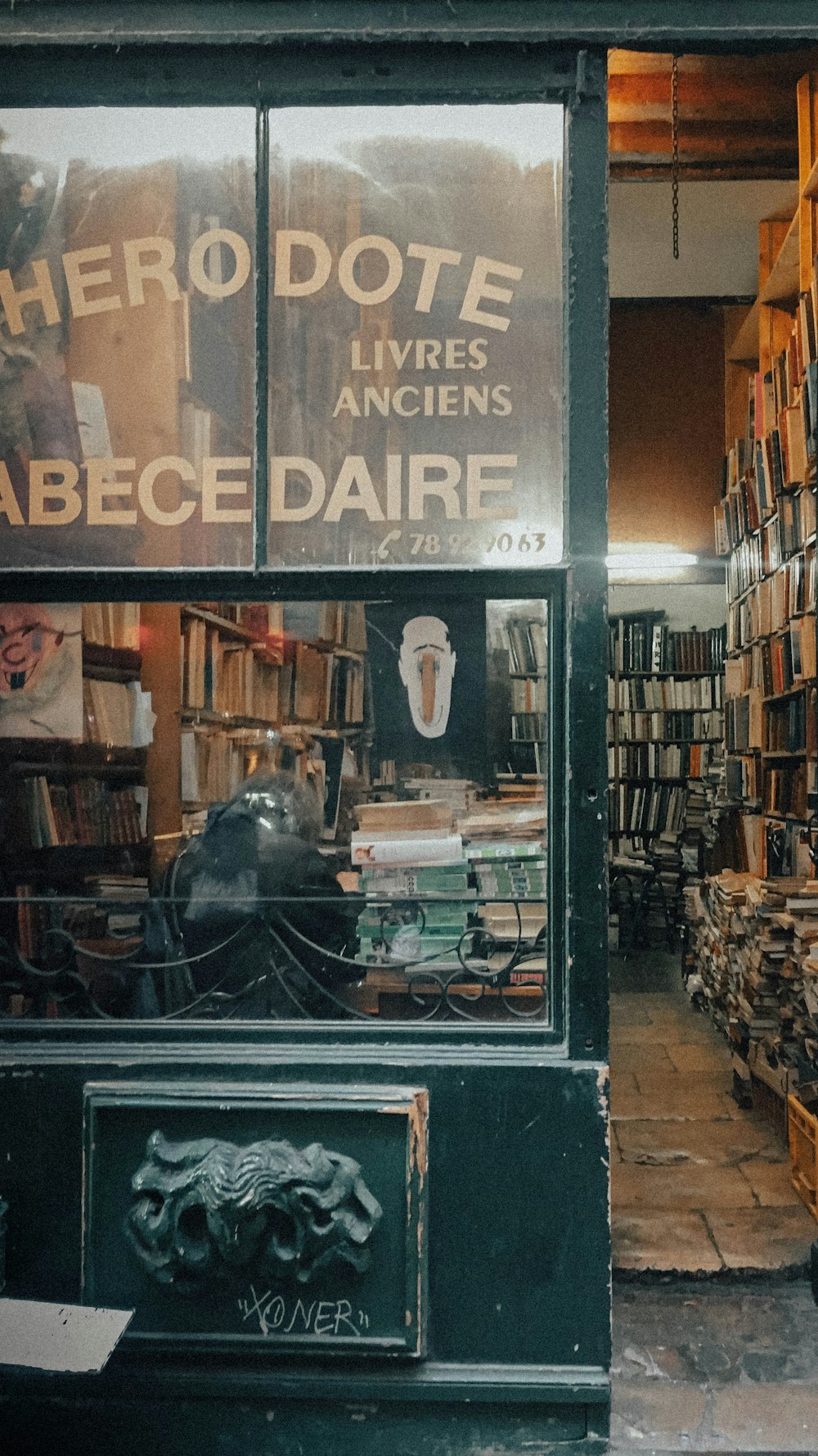 a store front with many books on display