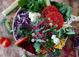 vegetable salad on white ceramic bowl