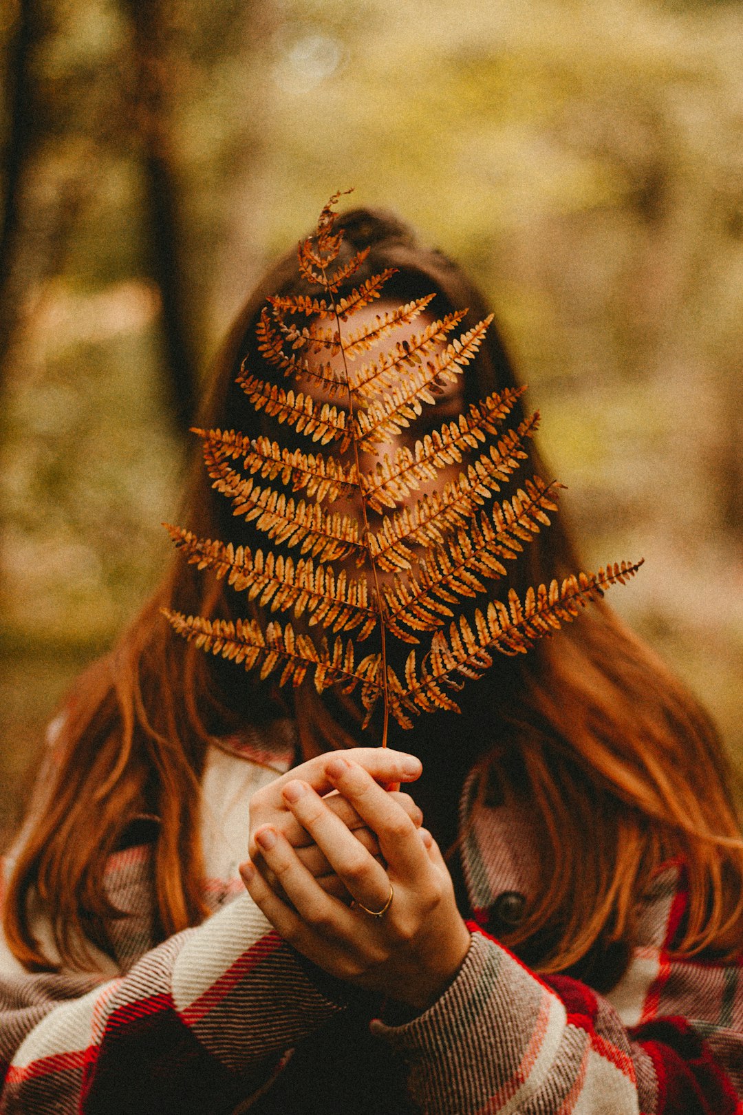 woman in brown knit cap