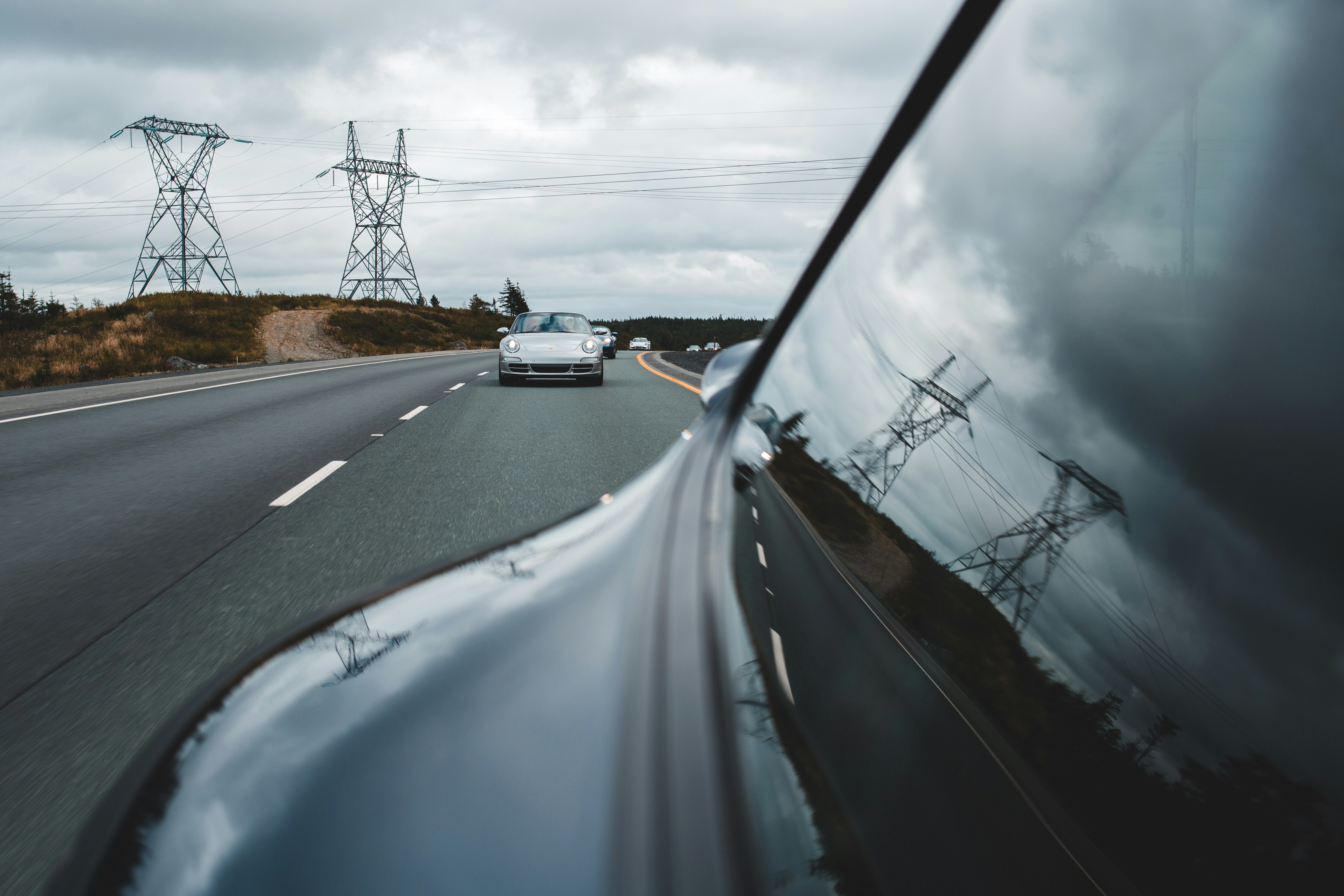 futuristic electric car highway, wallpaper, Lucid Hybrid Car Mileage 2026: Range and Efficiency Analysis 6