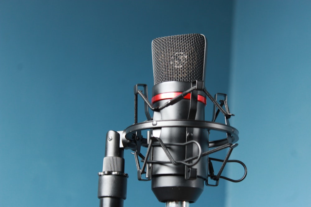 black and silver microphone with stand