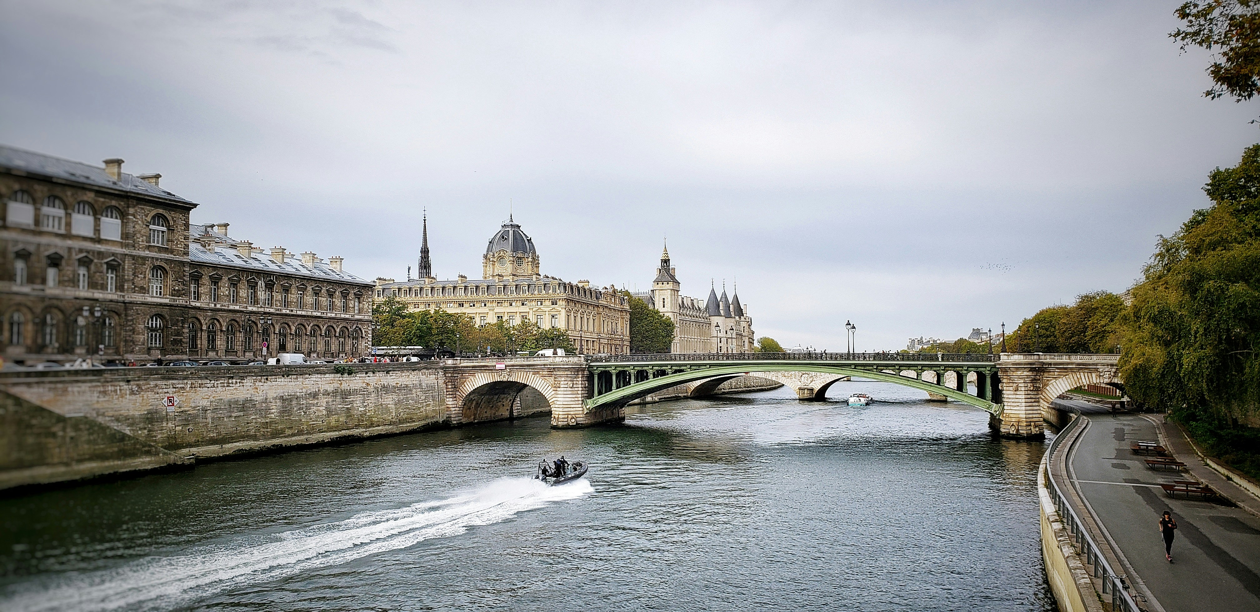 white and brown concrete bridge over river