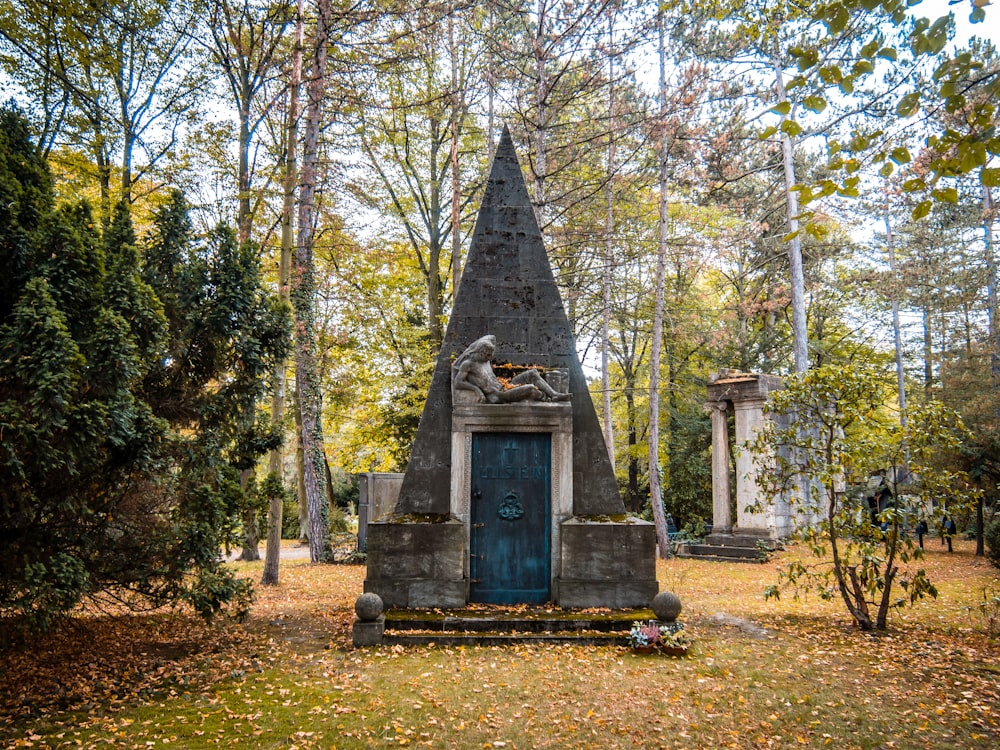 gray concrete tomb in the woods