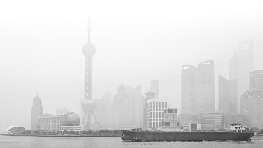 grayscale photo of city skyline during daytime