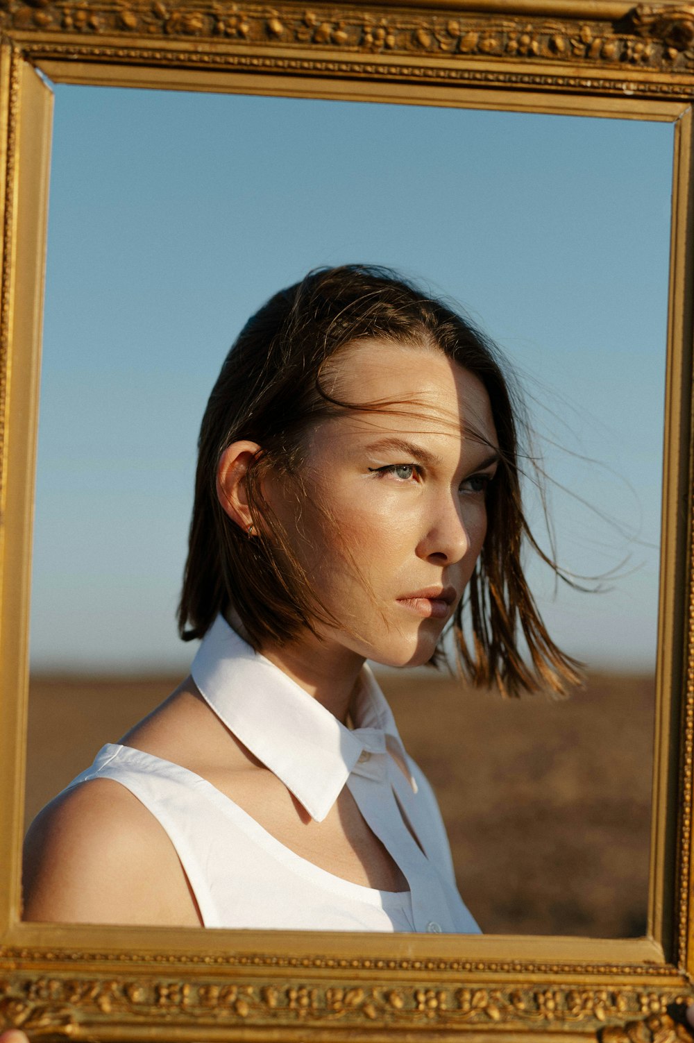 woman in white sleeveless top