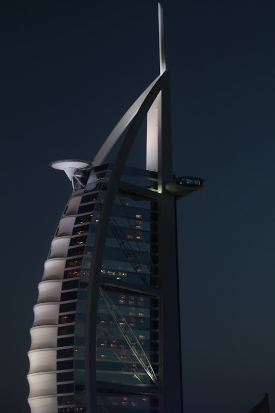 white and black concrete building in Burj Al Arab United Arab Emirates