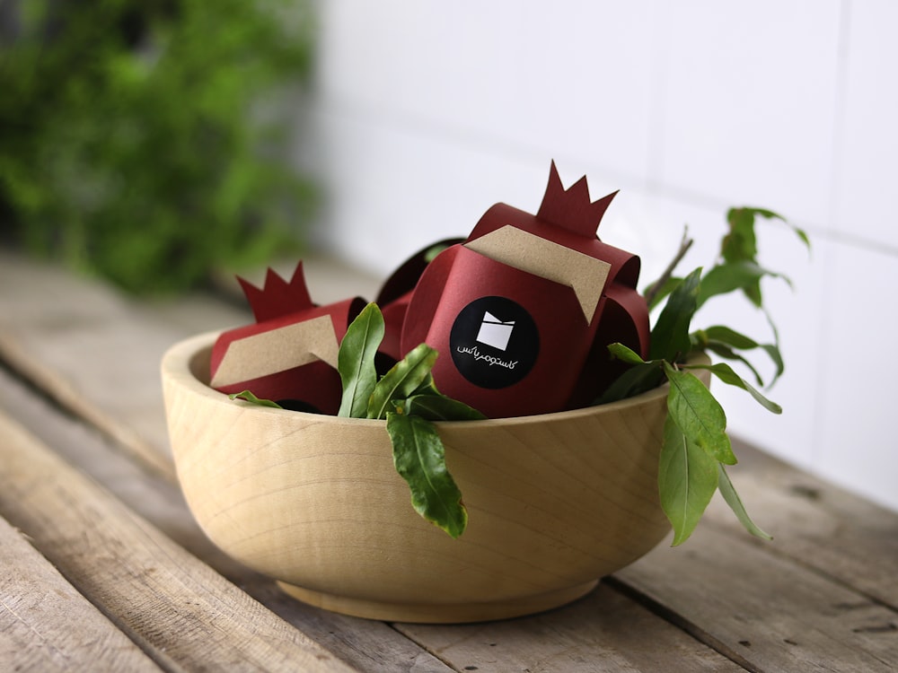 red and black house miniature on brown wooden table