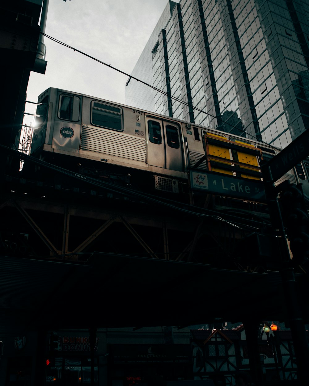 white and black train in the city during night time