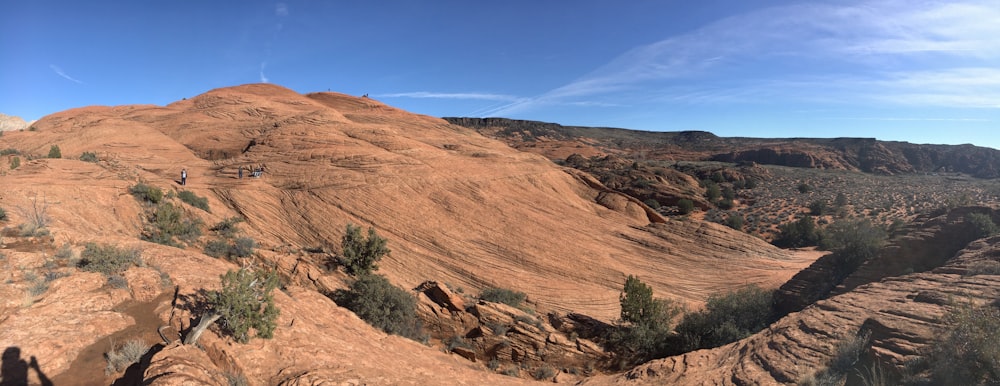 brown rocky mountain under blue sky during daytime