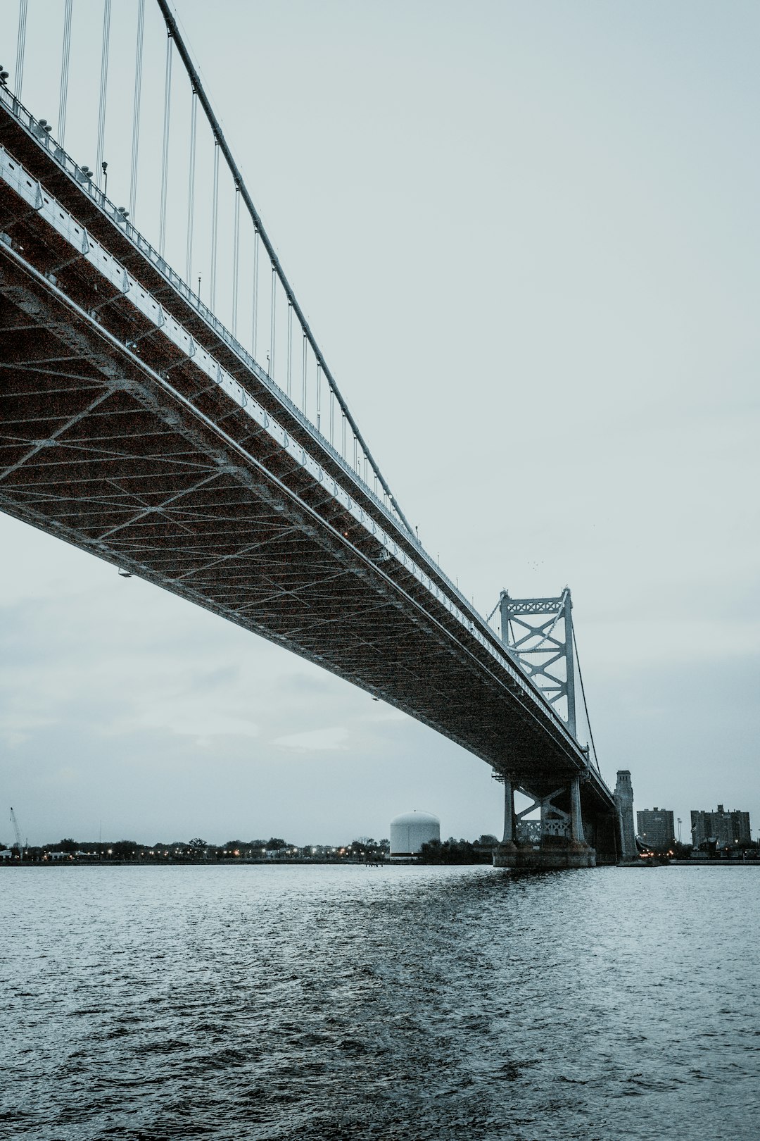 gray bridge over body of water during daytime