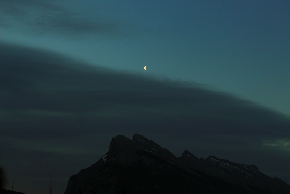 sun over the mountains and clouds