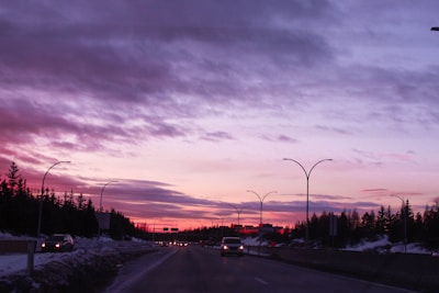 A freshly paved highway stretching through a scenic Samsun landscape at sunset, showcasing smooth asphalt and clear lane markings.
