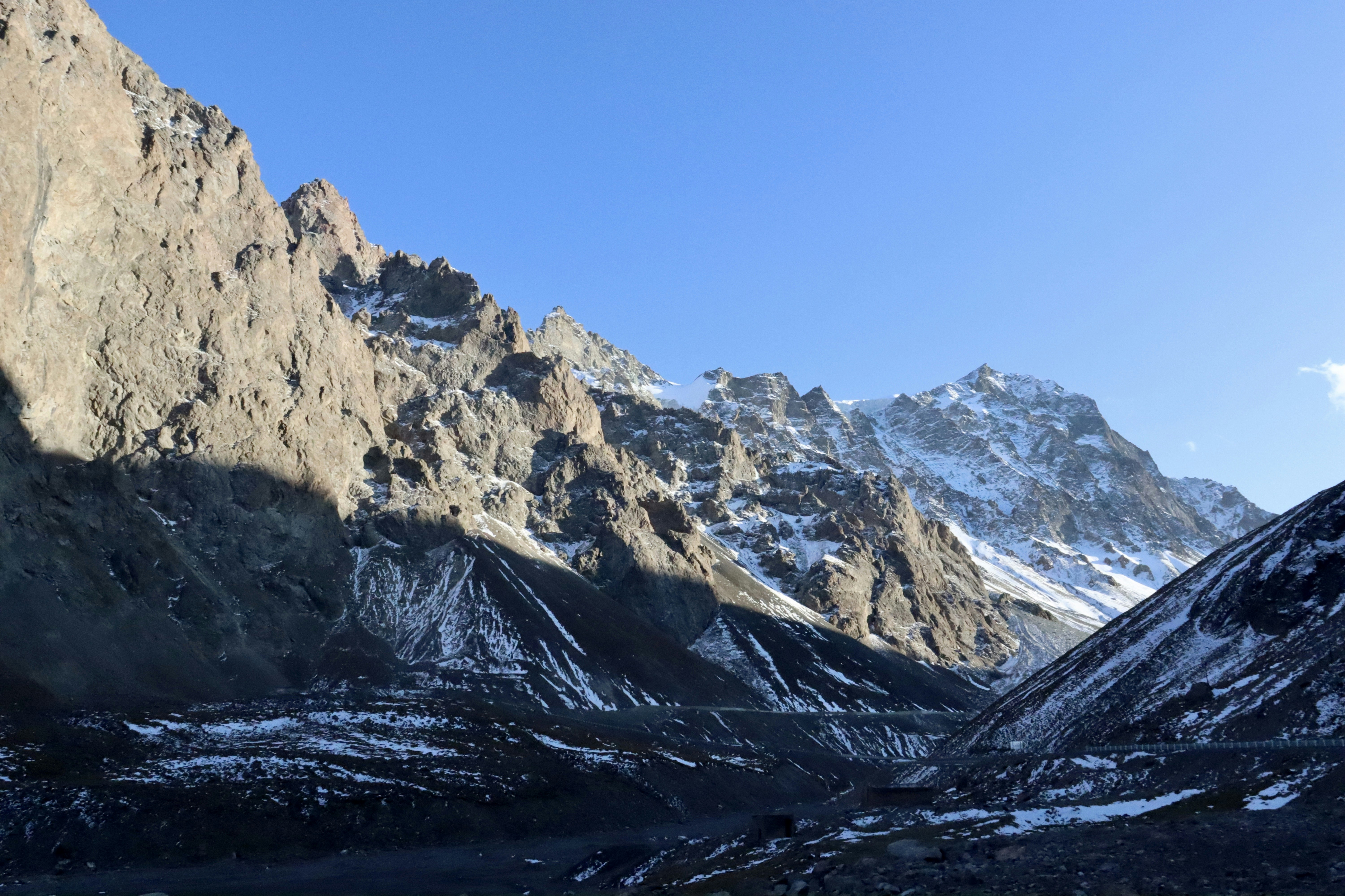 snow covered mountain during daytime