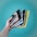A hand holding several colorful notebooks with elastic closures against a turquoise backdrop. The notebooks are in various colors including black, blue, green, and yellow.